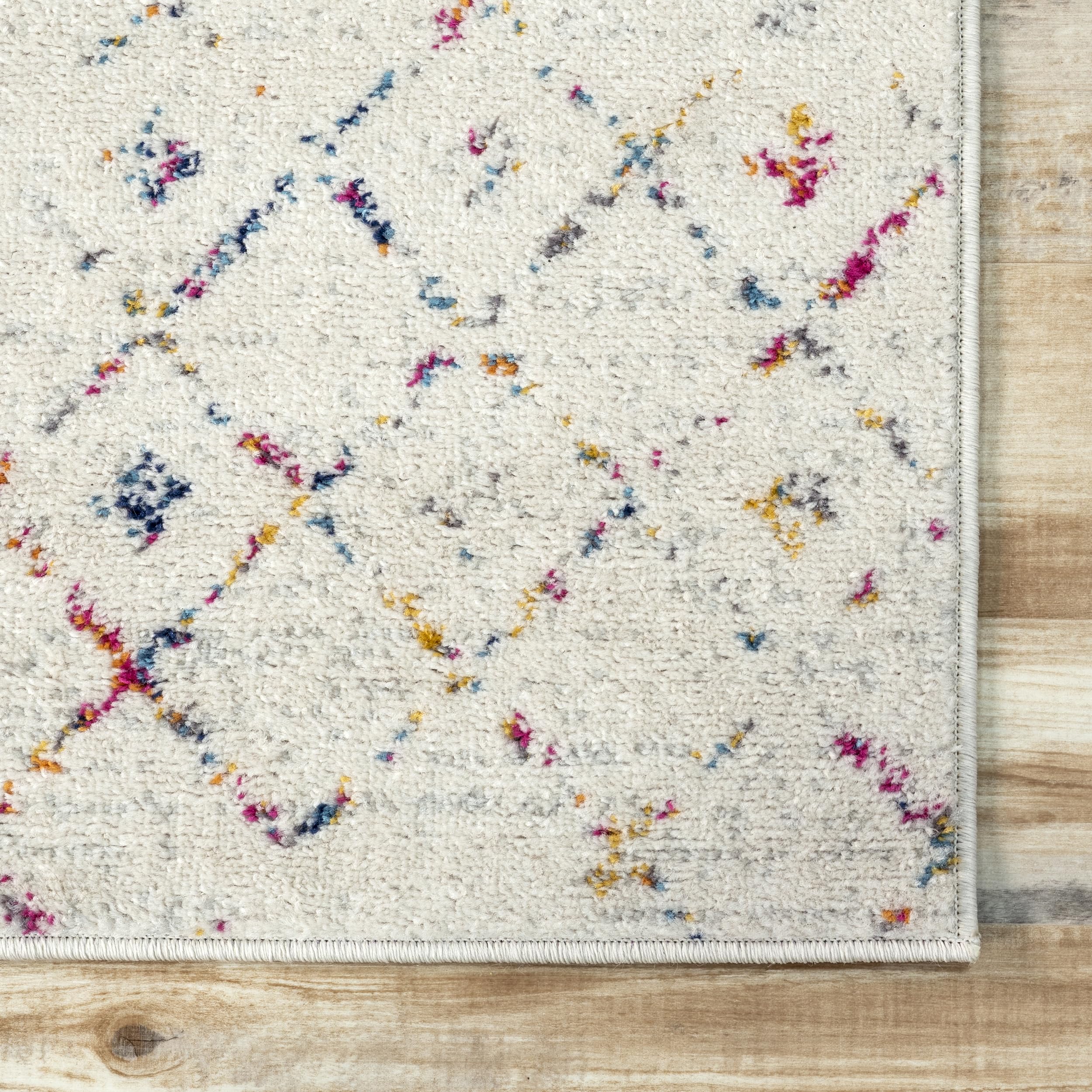 nuLOOM Blythe latex backing visible for slip resistance and secure placement