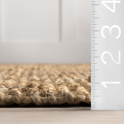 nuLOOM Daniela next to chair for scale showing ideal 5x8 proportion