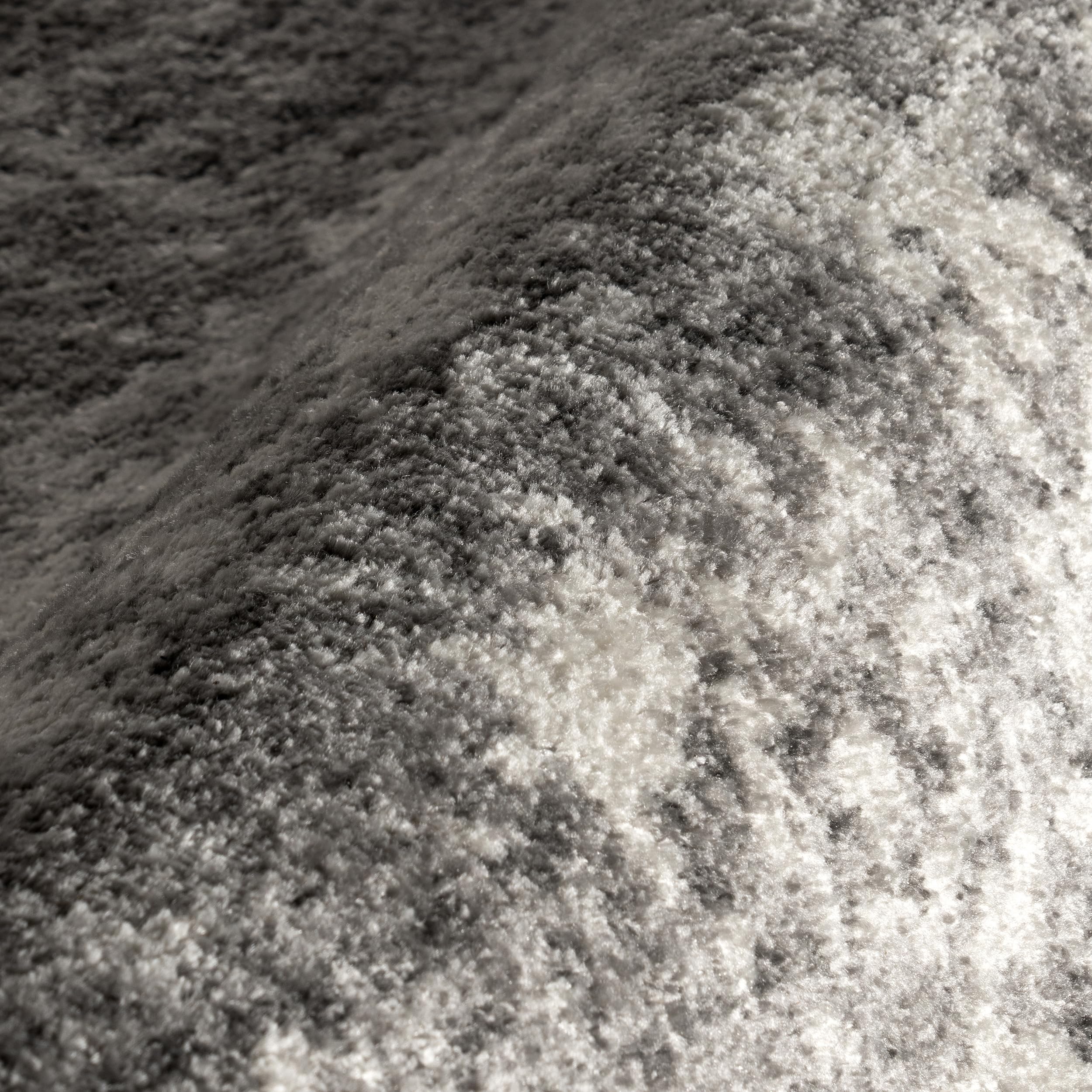 nuLOOM Deedra demo of liquid on surface showing stain resistance benefit: easy cleanup