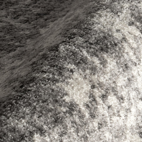 nuLOOM Deedra demo of liquid on surface showing stain resistance benefit: easy cleanup