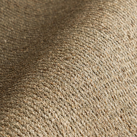 nuLOOM Elijah placed along a bed illustrating layered farmhouse or coastal styling