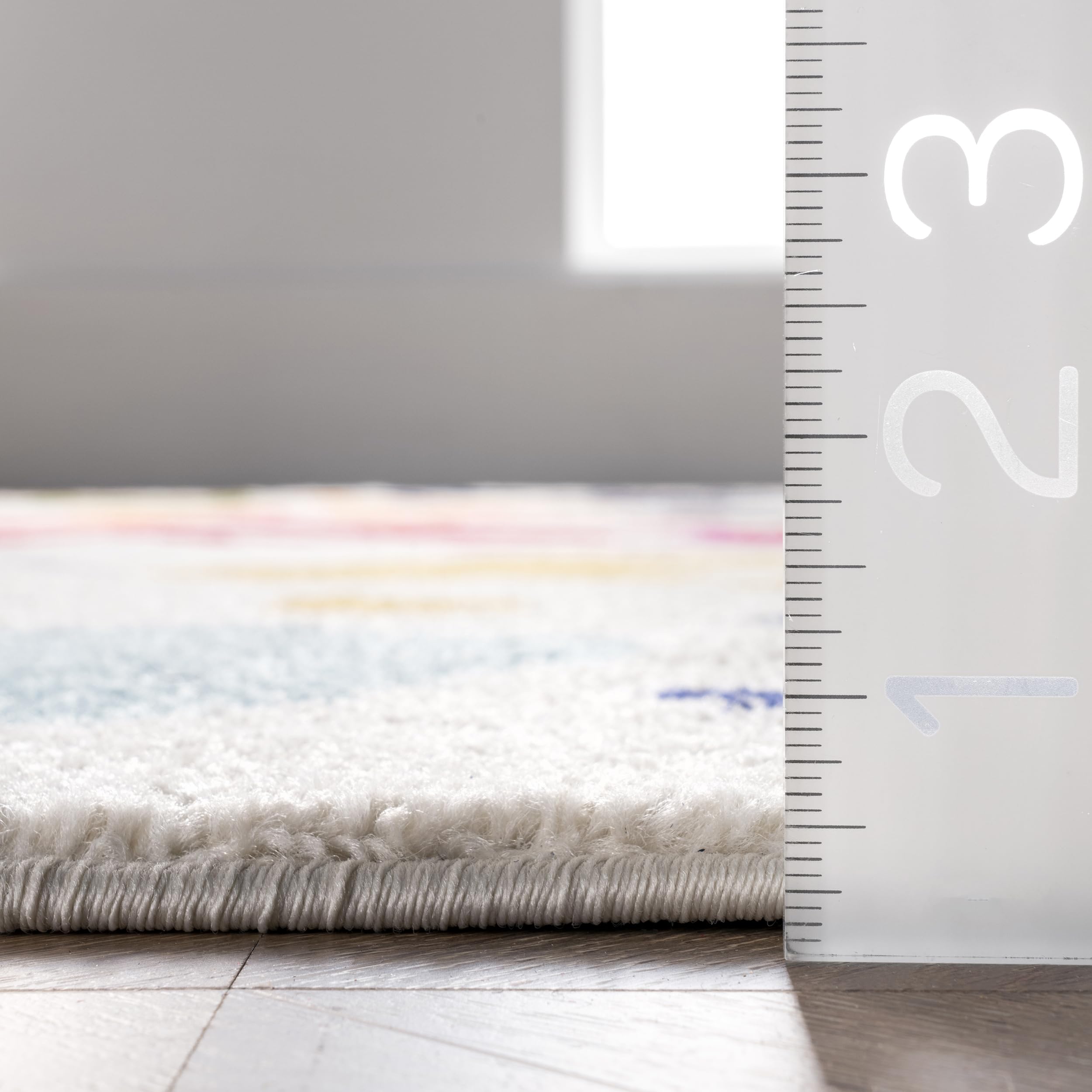 nuLOOM Pinkie rolled storage view shows compact storage and seasonal versatility