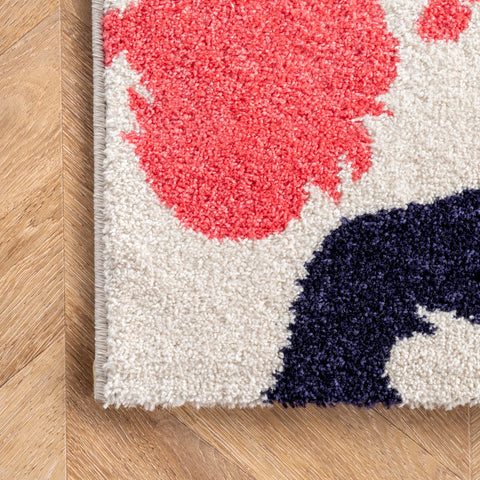 nuLOOM Pinkie stain-resistant demo reveals easy spot cleaning advantage
