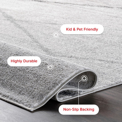 nuLOOM Thigpen under chair demonstrating size and furniture clearance