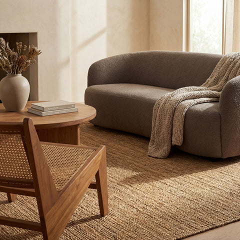 nuLOOM Ashli layered with a patterned rug illustrating stylish depth and balance
