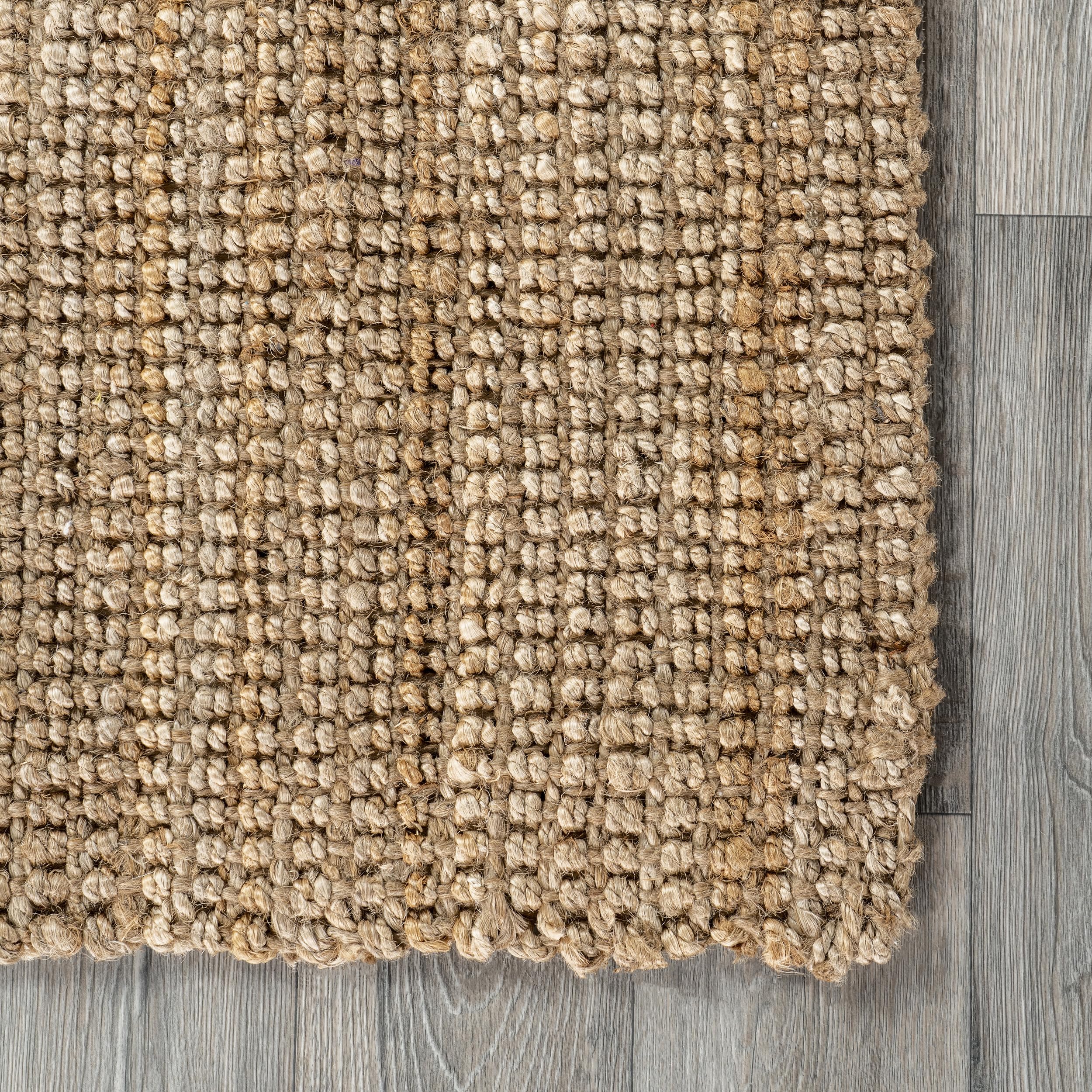 nuLOOM Ashli texture visible in hand demonstrating tactile natural fiber comfort
