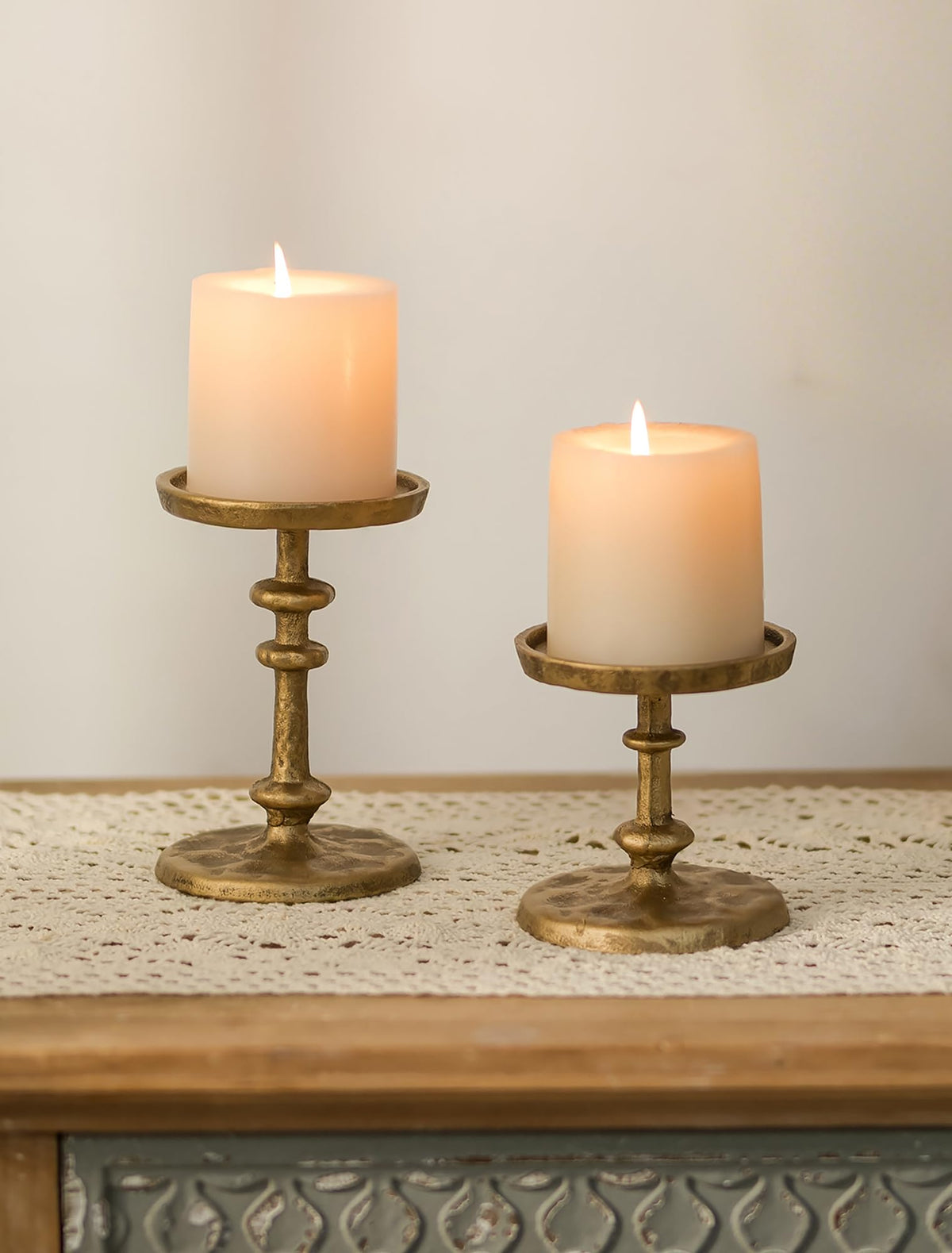 NUPTIO front view of antique brass candle holders showing elegant pairing benefit