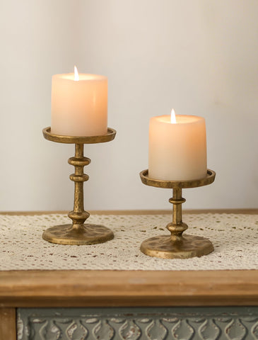 NUPTIO front view of antique brass candle holders showing elegant pairing benefit