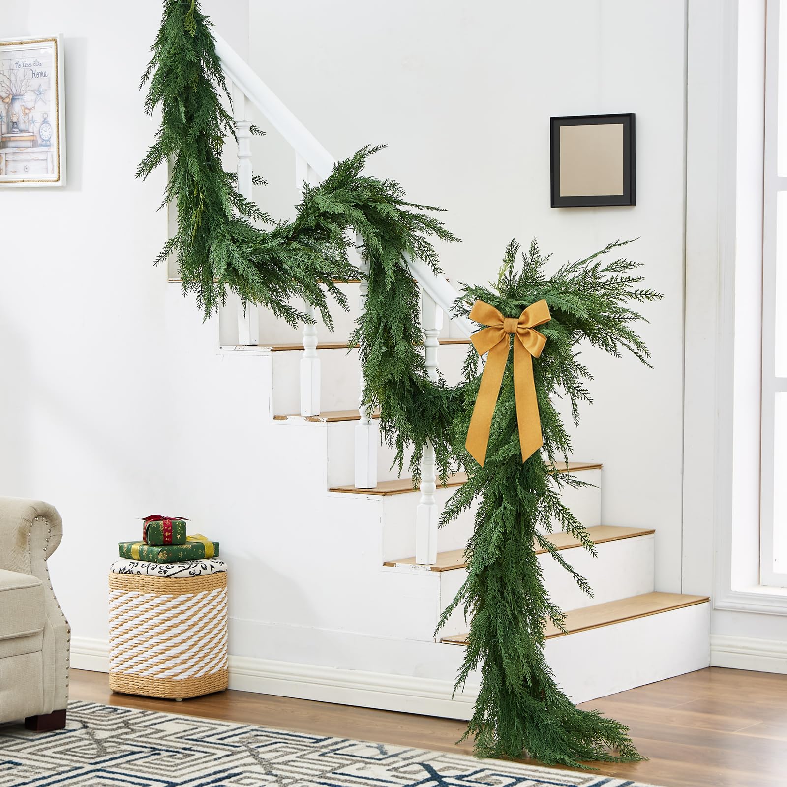 NUTIKAS hand holding garland to show true 12ft length and scale