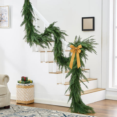 NUTIKAS hand holding garland to show true 12ft length and scale