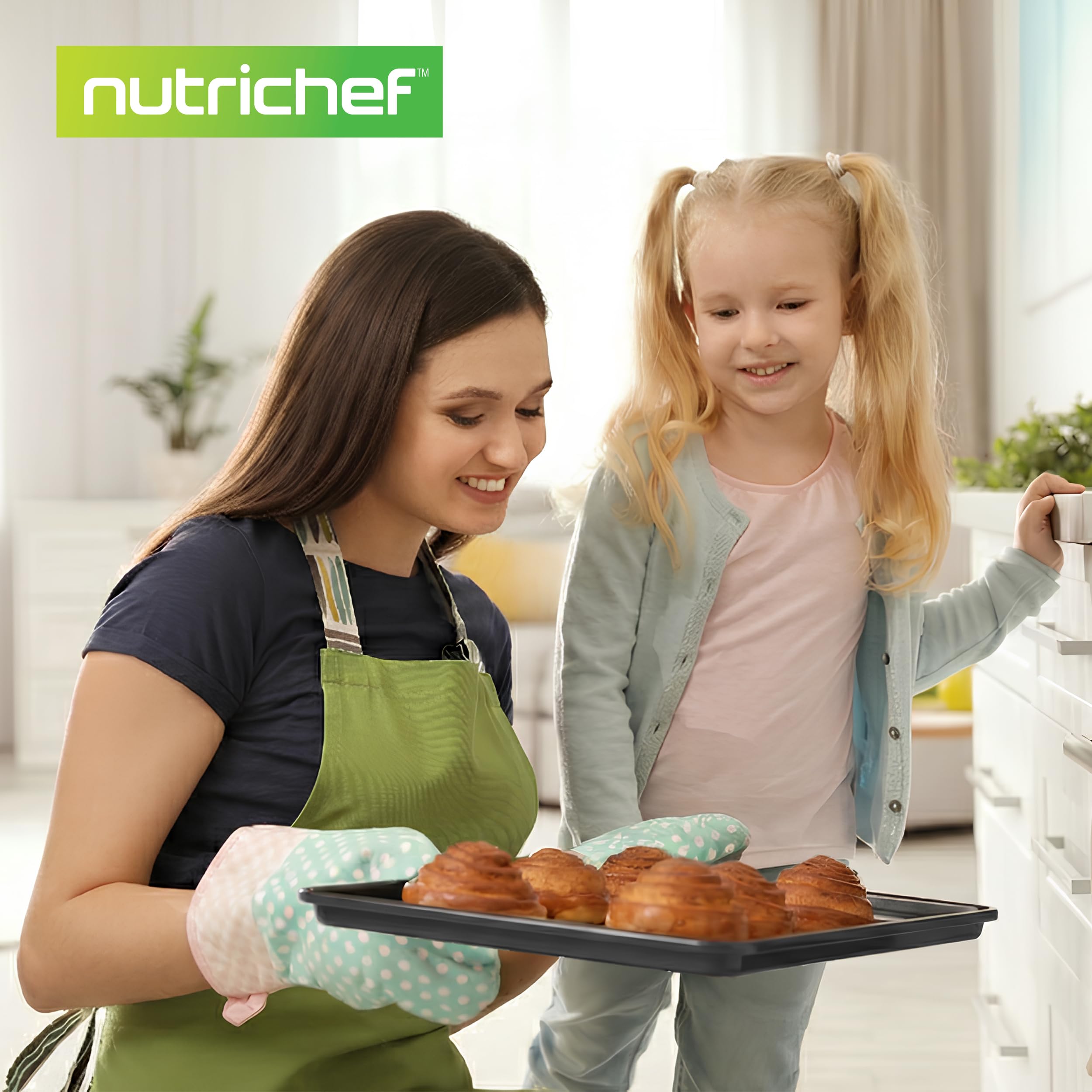 NutriChef lifestyle scene of person removing tray from oven showing everyday baking use
