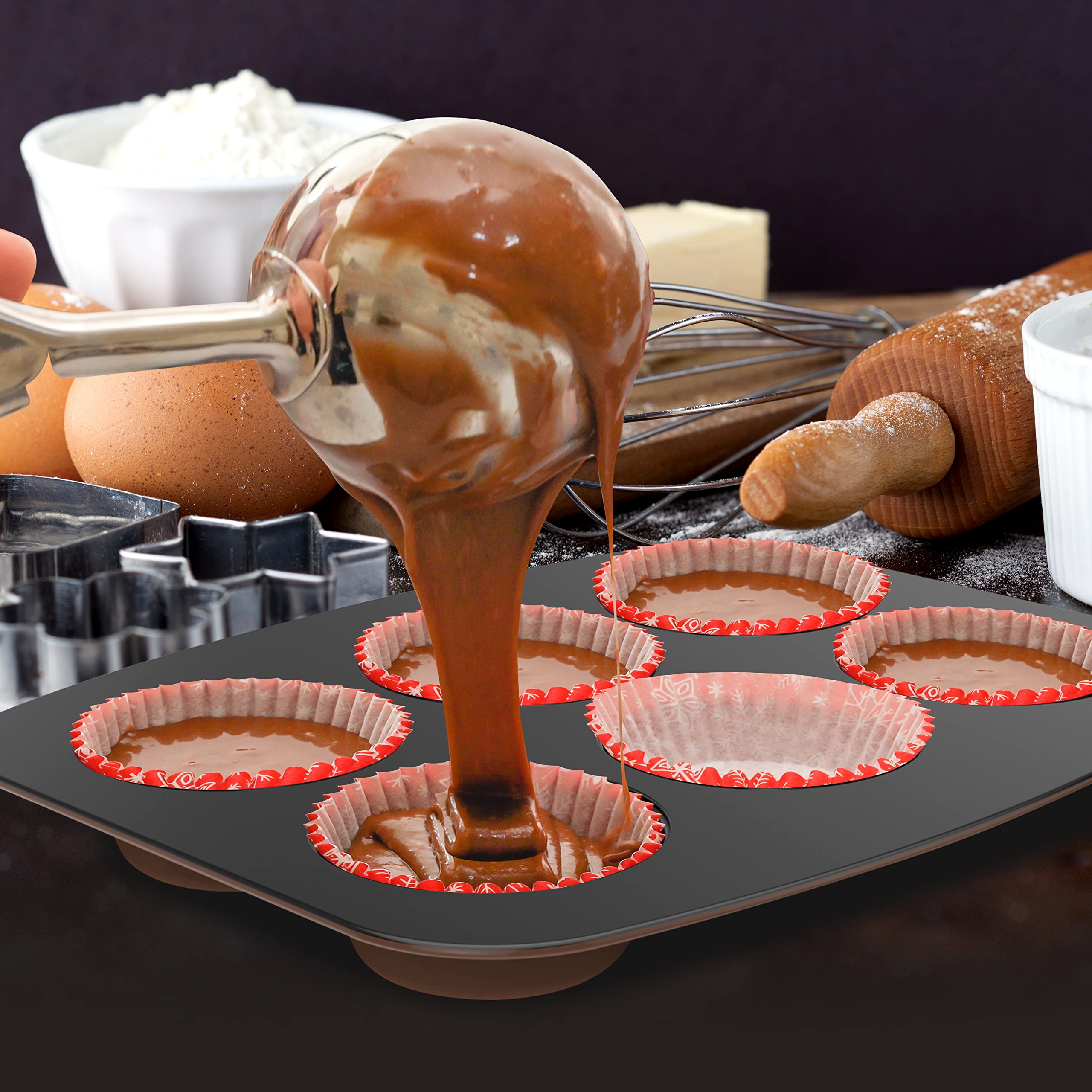 NutriChef bakeware displayed on kitchen counter with assorted baked goods, conveying home baking versatility
