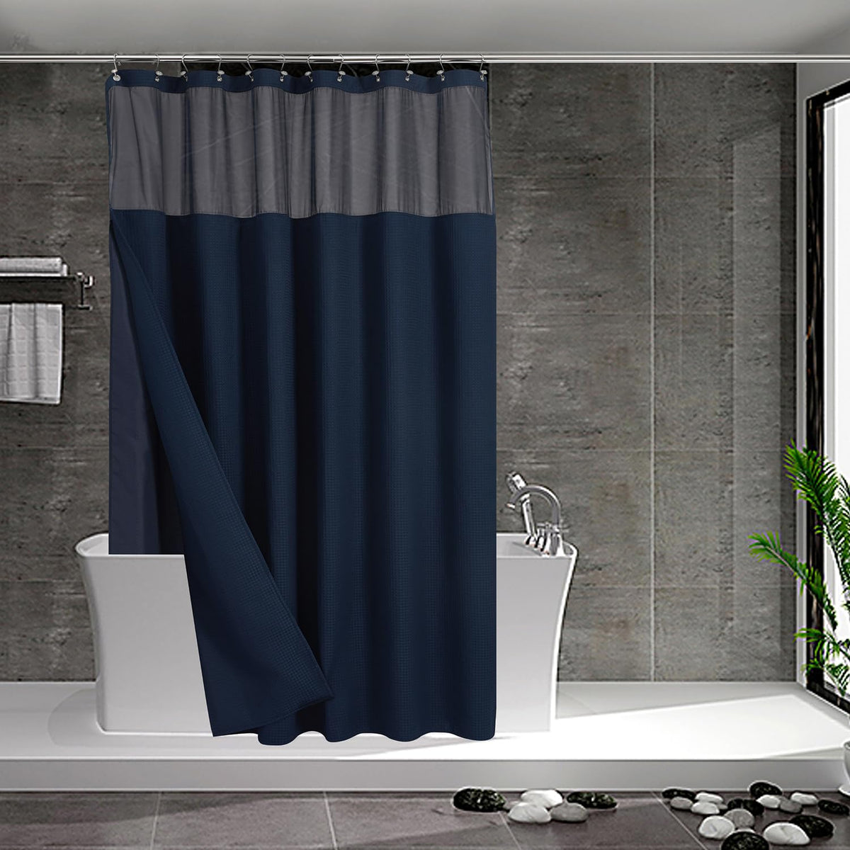 N&Y HOME front view of navy waffle weave curtain shows polished hotel look