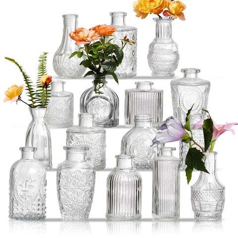ODBCYWM front view of assorted clear bud vases showing vintage shapes for elegant tables
