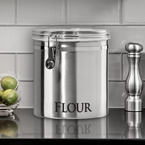 Oggi canister beside a mug showing scale and space-saving benefit