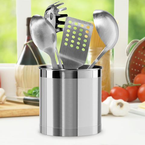Oggi utensil crock filled with spatulas ladles and whisks for easy access while cooking