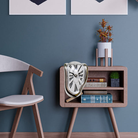 OHmaker melting clock next to books showing compact size and scale benefit