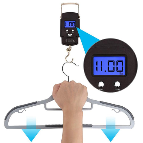 OIKA hanger beside ruler showing slim 0.2-inch profile to save space