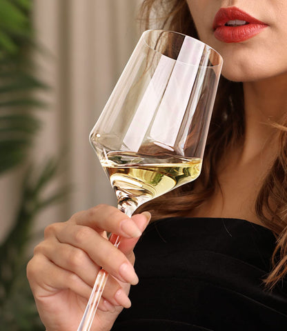 OJA close-up of thin rim highlighting crystal clarity and smooth pour