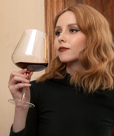 OJA in use with red wine being poured to boost breathing and bouquet