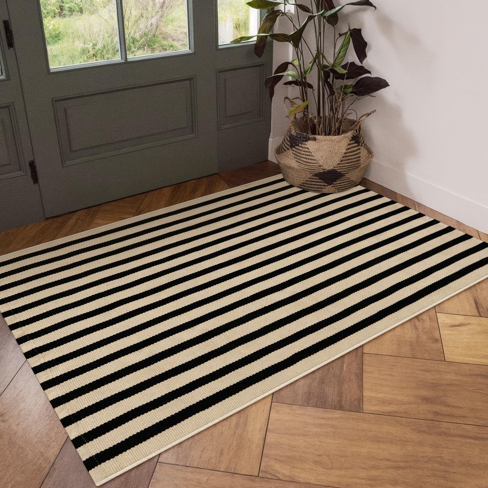 OJIA folded rug ready for washing emphasizing easy machine‑wash care