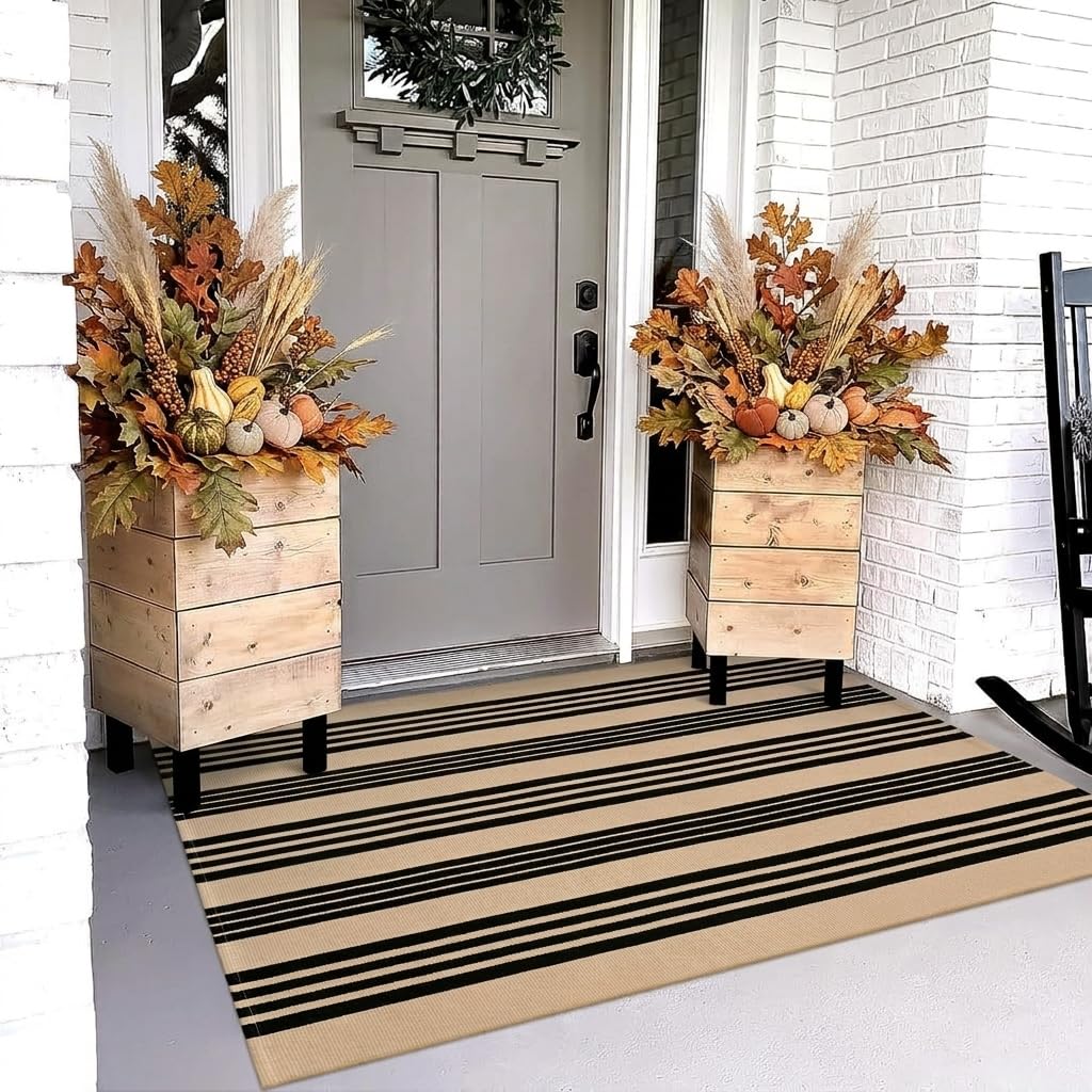 OJIA front view of black and tan outdoor rug showing clean entry styling benefit