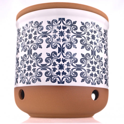Okavango garlic keeper front view shows terracotta jar and tidy countertop storage benefit