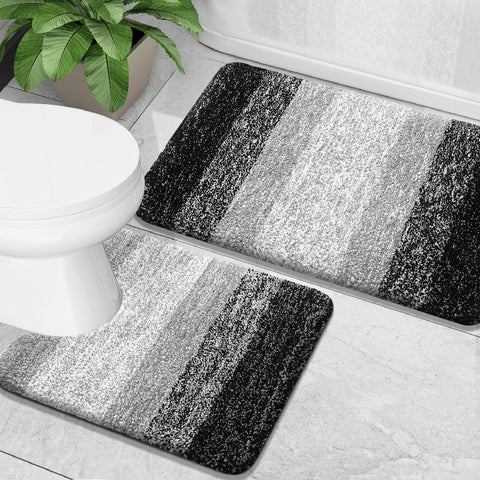 OLANLY front view of black rug set showing matching pieces and stylish benefit