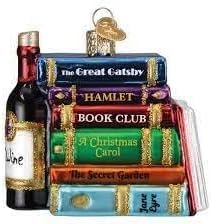 Old World Christmas front view showing book spines and ruby bottle, adds festive charm