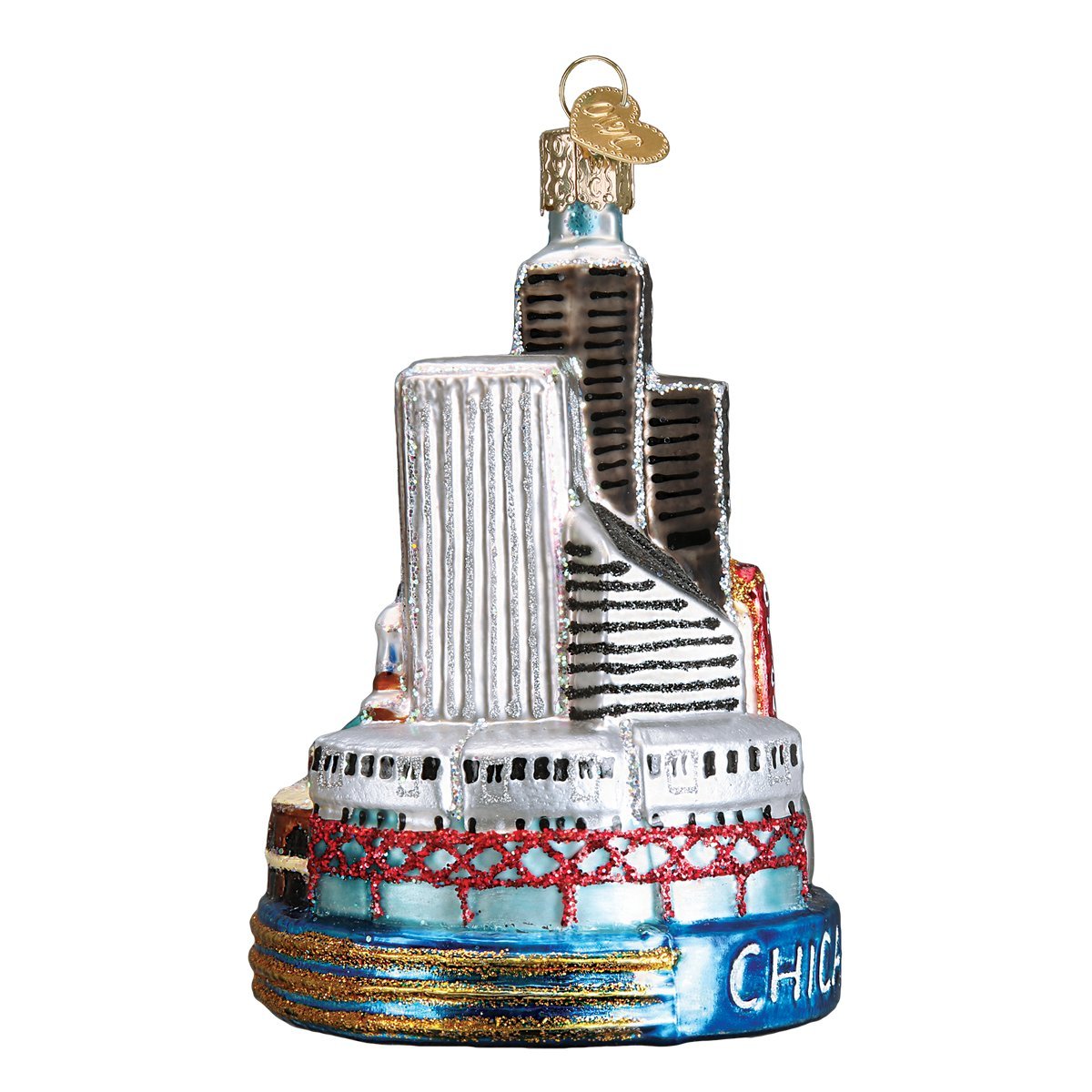 Old World Christmas ornament hanging on tree adding city-themed sparkle to decor