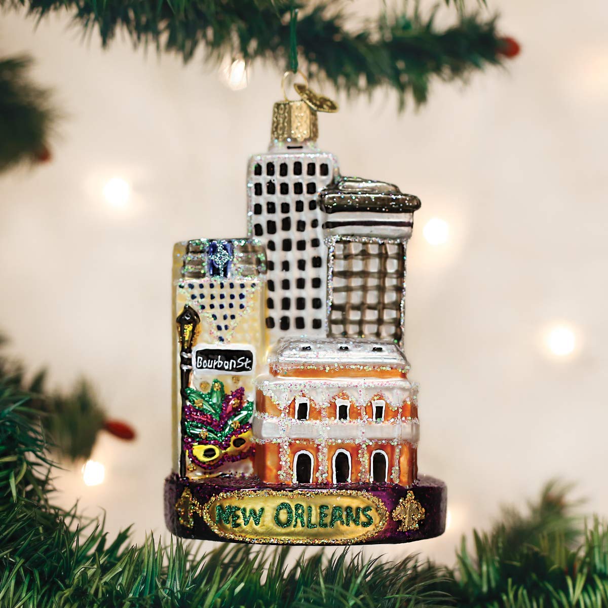 Old World Christmas ornament close-up of hand-painted detail and glitter highlights