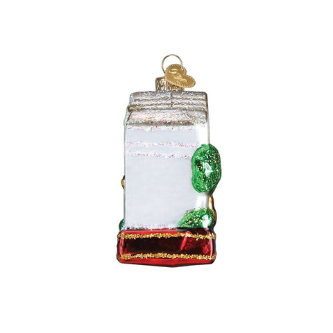 Old World Christmas ornament hung on holiday tree showing coastal colors enhancing lights