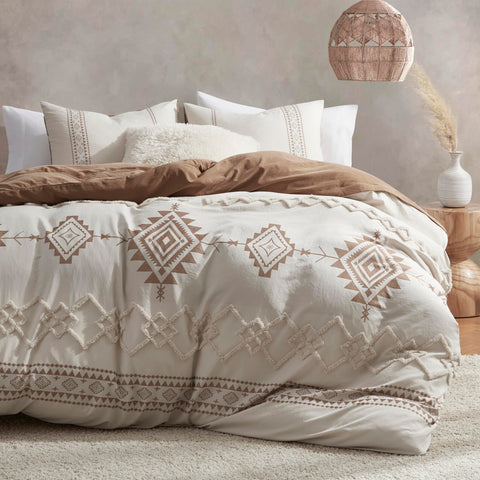 Oli Anderson front view of duvet cover showcasing beige terracotta pattern and cozy appeal
