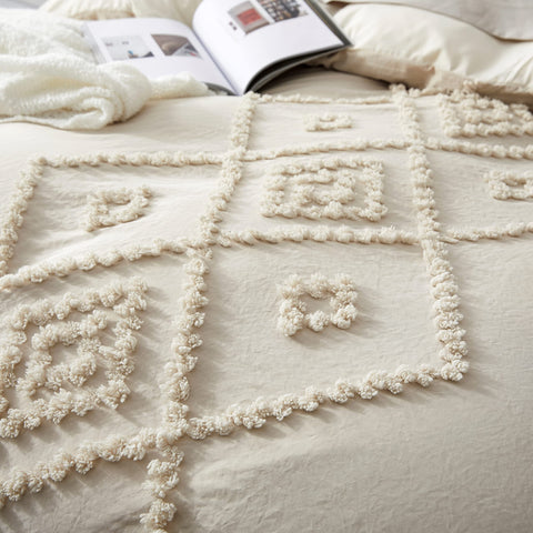 Oli Anderson folded duvet set in closet demonstrating easy storage convenience
