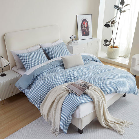 Oli Anderson reversible view with solid blue back for a calm, coordinated bedroom option