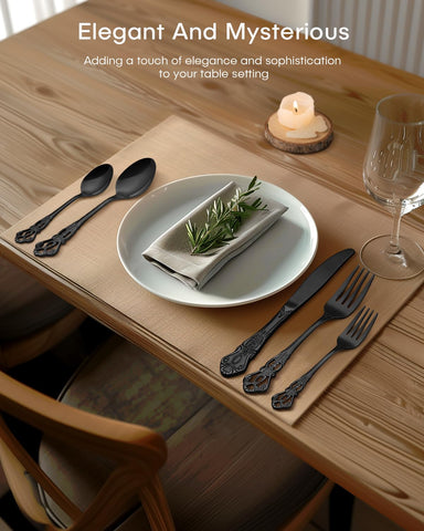 Ollex flatware in a dinner party setting adding dramatic black contrast and elegance