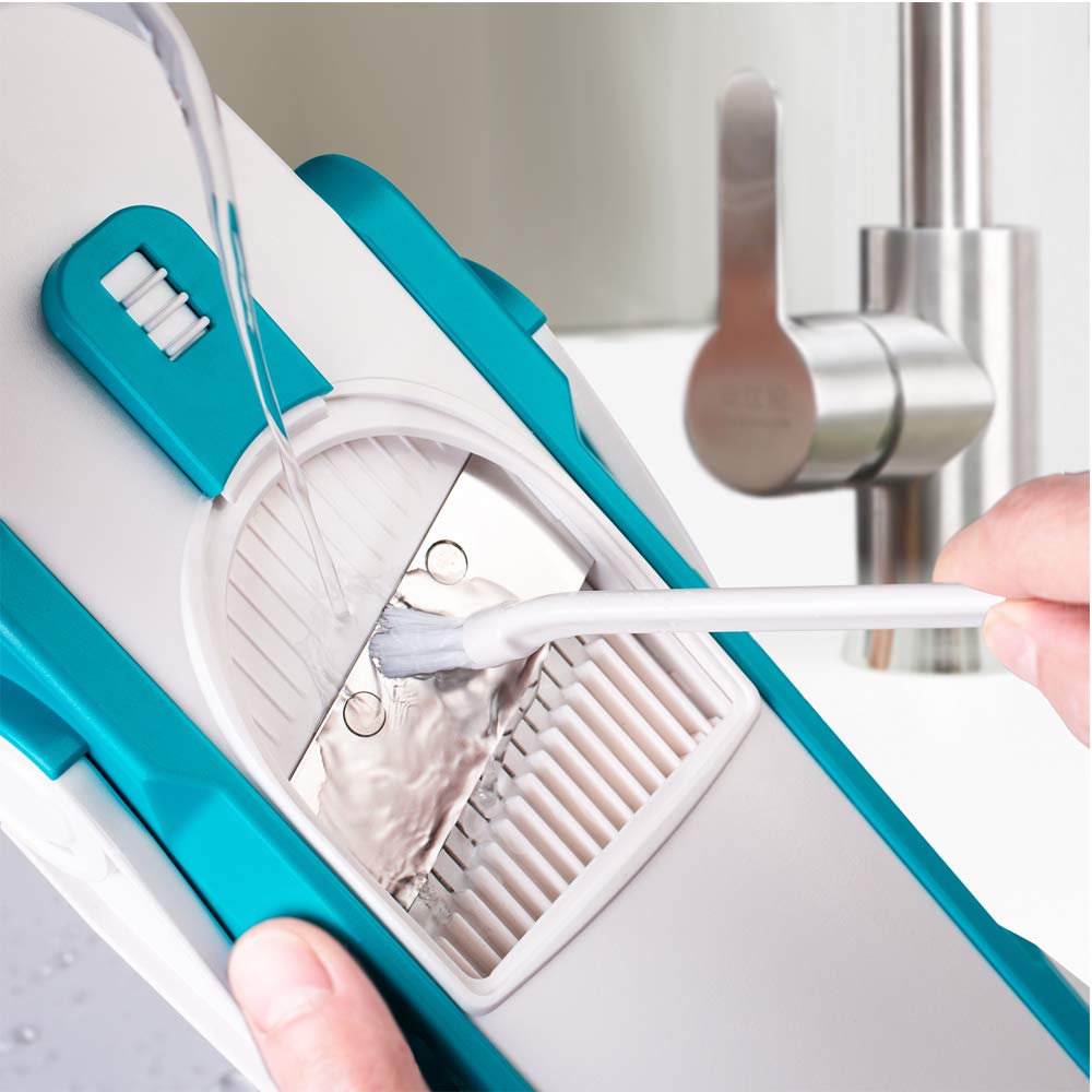 ONCE FOR ALL mandoline in use slicing potatoes quickly for consistent results