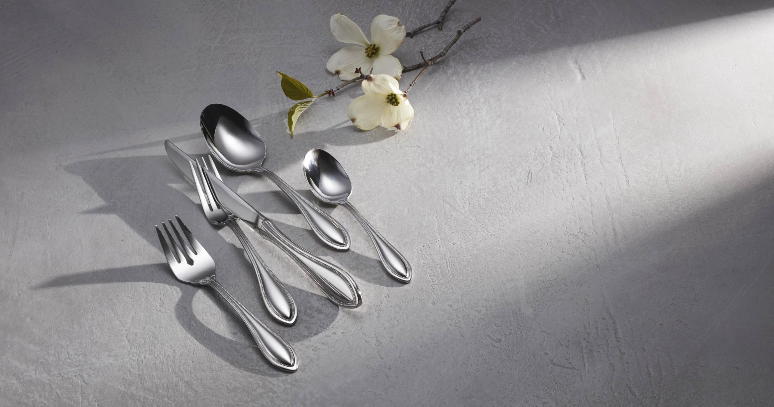 Oneida American Harmony polished finish closeup showing reflective stainless durability
