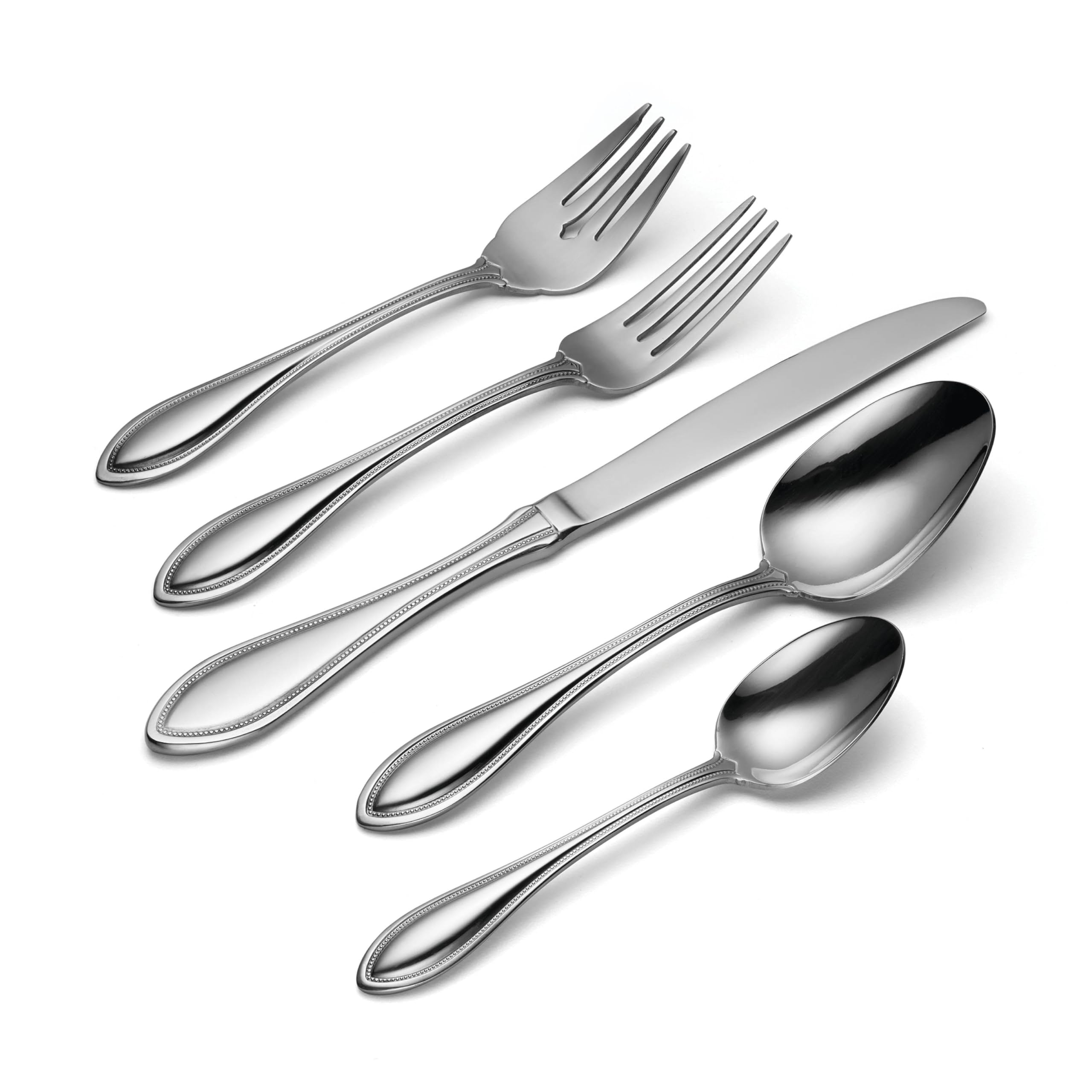 Oneida American Harmony serving set arranged to show included utensils and versatility