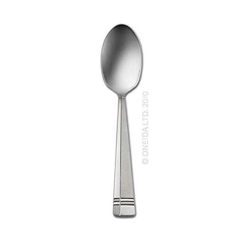 Oneida Amsterdam flatware arranged on a dining table with plate for stylish everyday dining