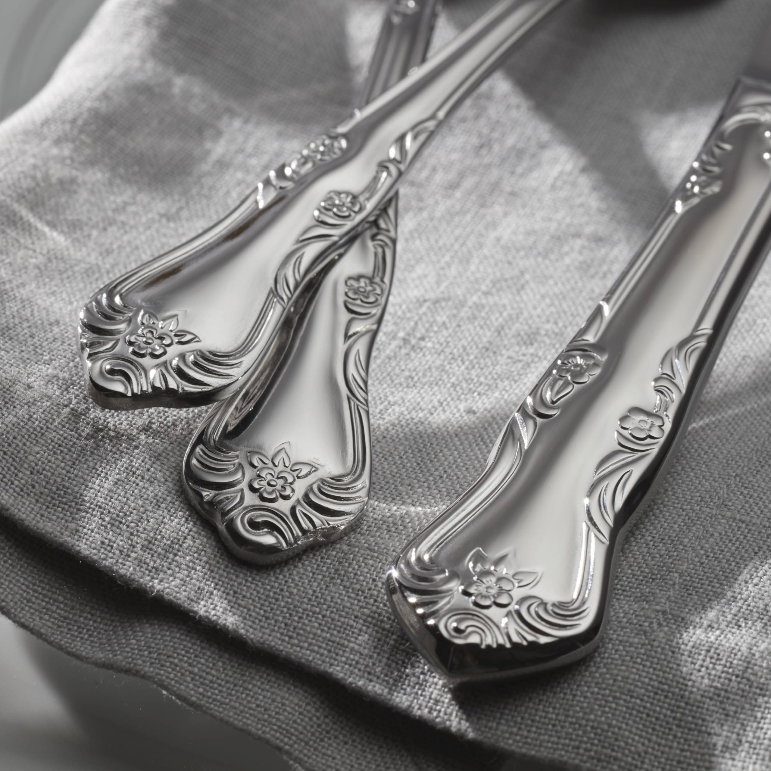 Oneida Azalea spoon held in hand to show scale and ergonomic balance benefits