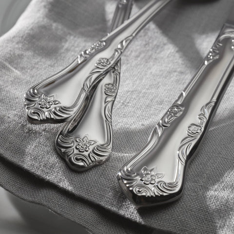 Oneida Azalea spoon held in hand to show scale and ergonomic balance benefits