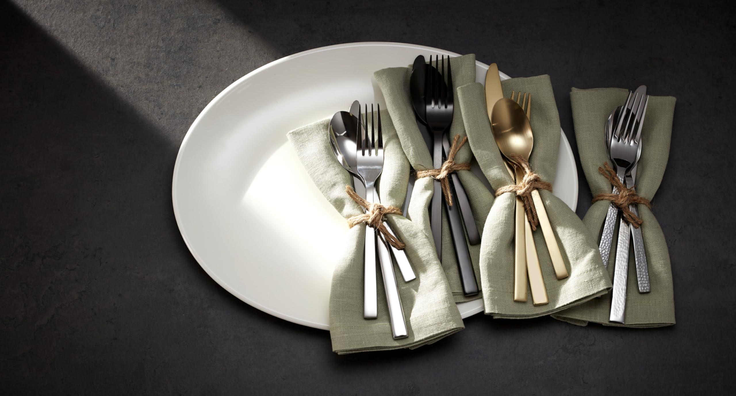 Oneida Chef's Table arranged on napkin displaying set composition and polished look