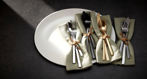 Oneida Chef's Table arranged on napkin displaying set composition and polished look