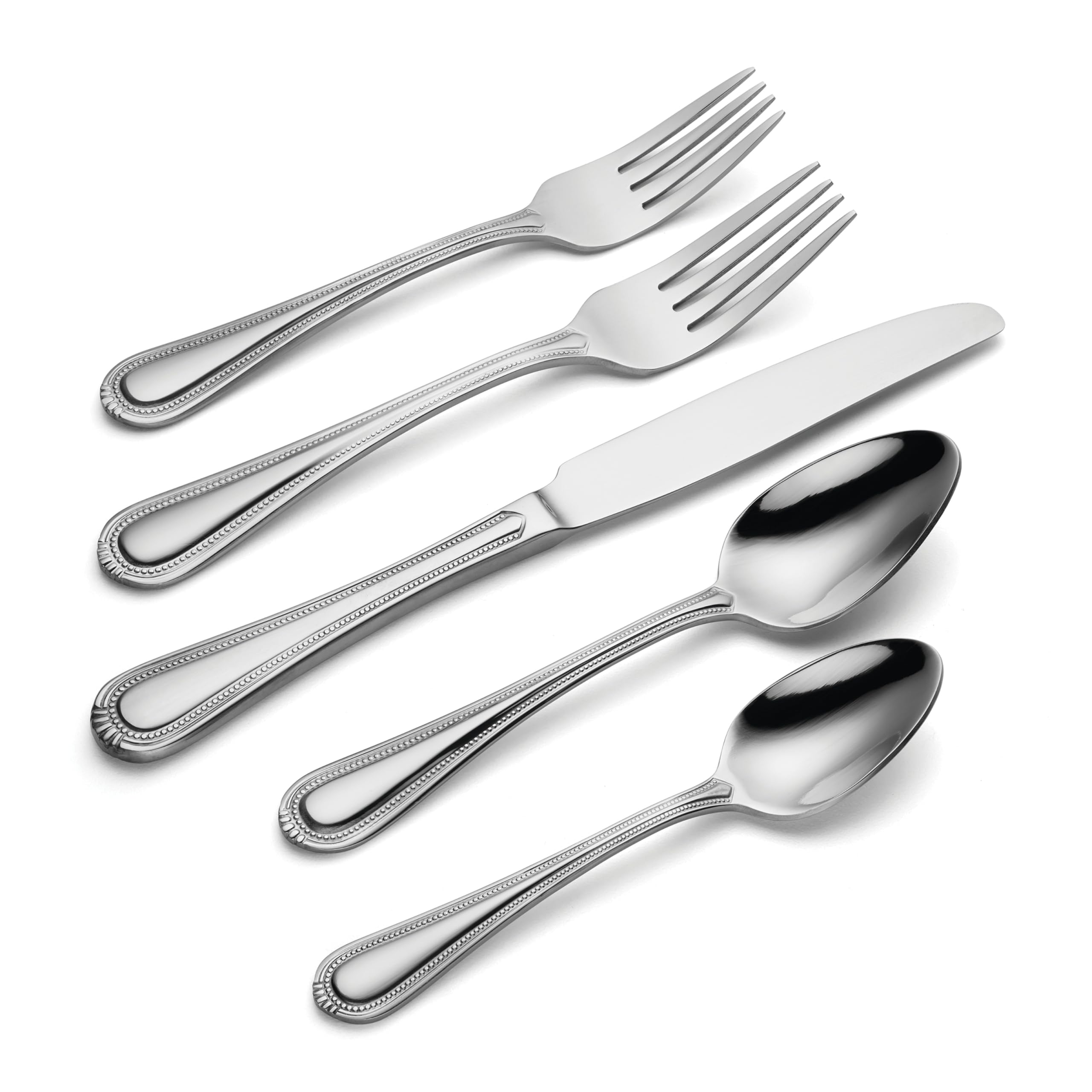 Oneida Countess flatware arranged at a dinner plate showing cohesive table styling