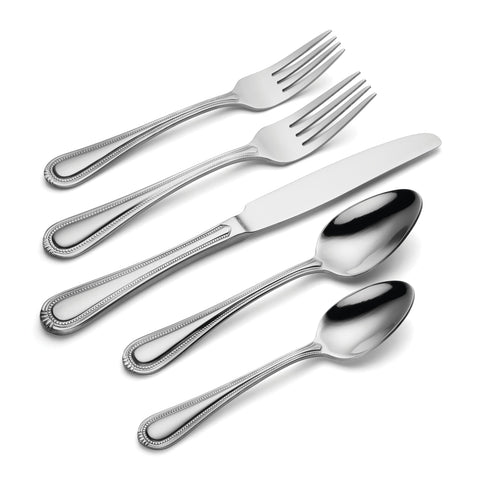 Oneida Countess flatware arranged at a dinner plate showing cohesive table styling