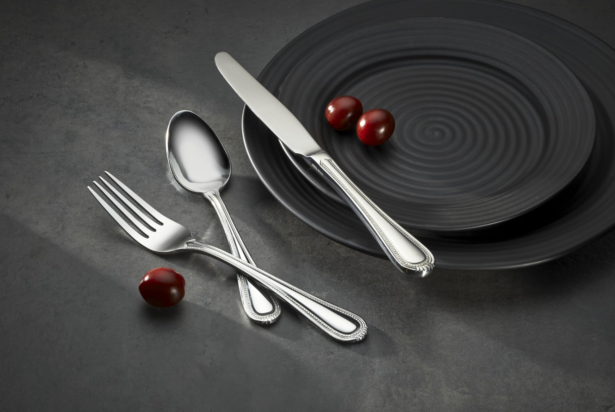 Polished Oneida Countess handle reflecting light to show finish and shine