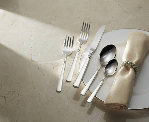 Oneida Easton beside tablespoon showing scale and size benefit: clear portioning reference