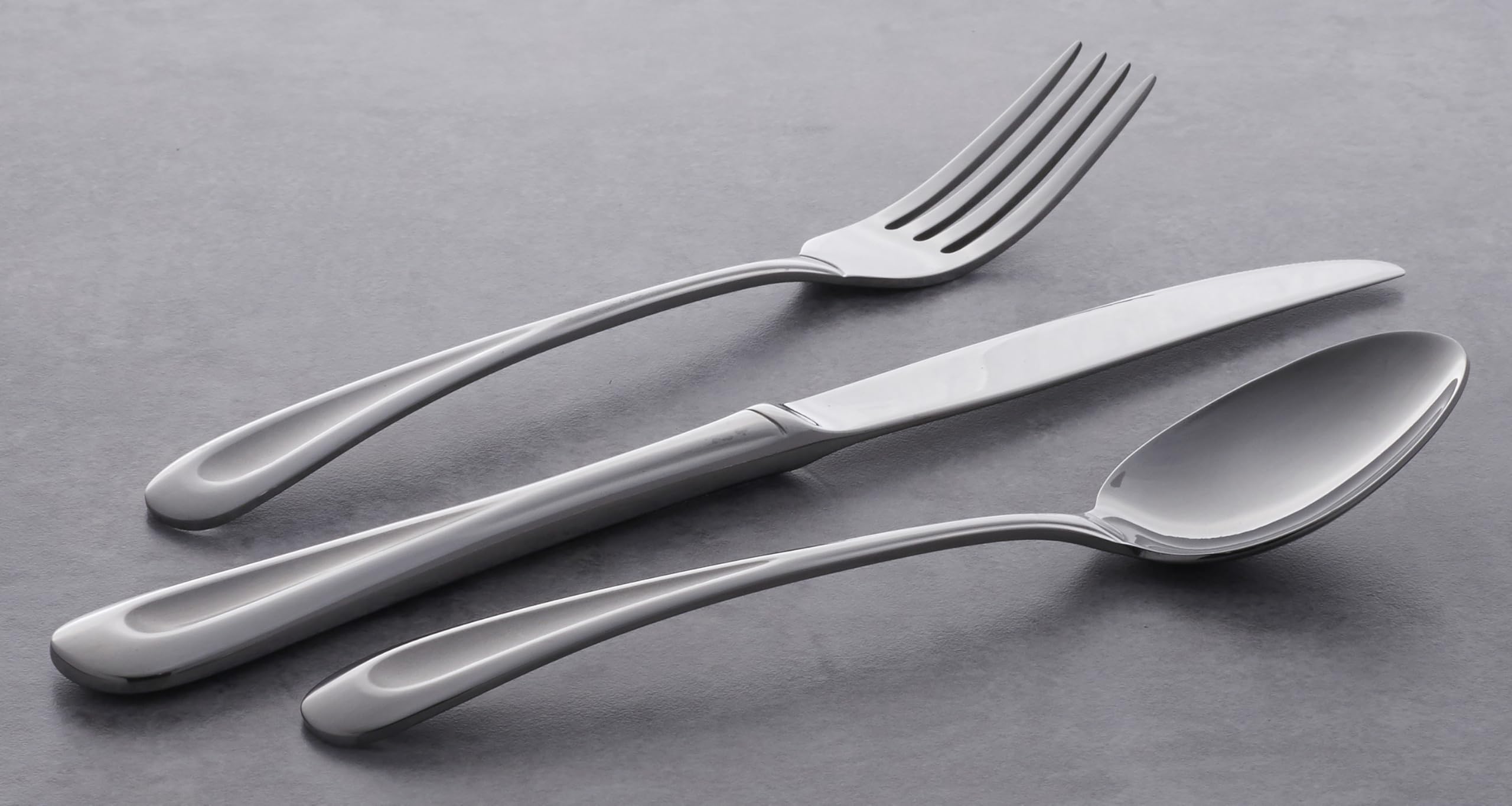 Oneida utensils in a dining scene showing how the set elevates meal presentation