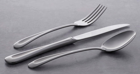 Oneida utensils in a dining scene showing how the set elevates meal presentation